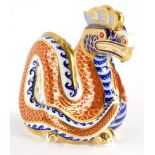 A Royal Crown Derby porcelain paperweight of a dragon, with silver coloured stopper, 11cm high.