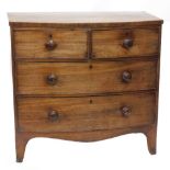 A 19thC mahogany bowfronted chest, of two short and two long drawers, with turned wood handles on br