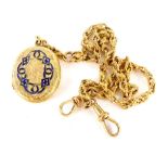 A 9ct gold locket pendant and watch chain, the oval locket heavily embossed and bearing the initial