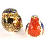 Two Royal Crown Derby porcelain paperweights, of Little Owl and a Robin, with gold coloured and silv