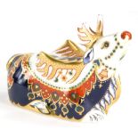 A Royal Crown Derby porcelain paperweight of a reindeer, with gold coloured stopper, 10cm high, boxe