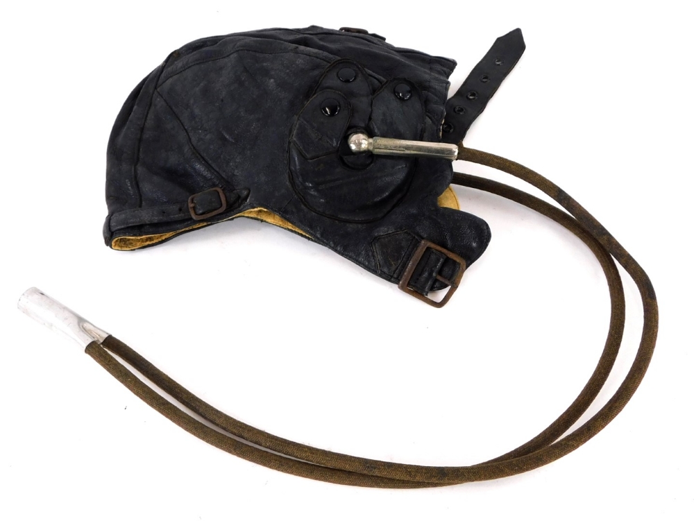A WWII type leather flying cap.