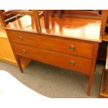 An Edwardian mahogany and chequer banded chest of drawers, the top with a raised back above a moulde