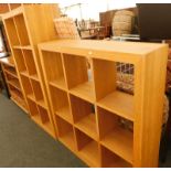 Two open oak sectional bookcases.