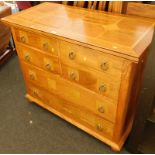 A Barker and Stonehouse hardwood chest of four short and two long drawers, the top inlaid with marbl