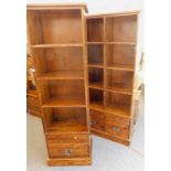 A Laura Ashley hardwood freestanding three sectional bookcase, and a further single unit.