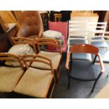 A collection of chairs, to include teak framed examples, etc. (a quantity) The upholstery in this l