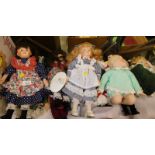A collection of bisque faced dolls, in various dress, etc., (a quantity).