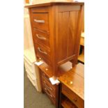 A pair of hardwood three drawer bedside cabinets.
