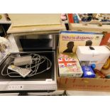 A Panasonic Eco 1000 watt microwave, a Sharp 20" LCD TV with lead and remote, various board games, t