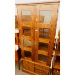 A Laura Ashley display cabinet, the top with two glazed doors, above four drawers.