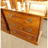 A Laura Ashley hardwood chest of three long drawers, with metal handles, 83cm high, 86cm wide, 43cm