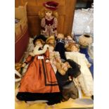 A quantity of bisque faced dolls, in various dress, etc., (a quantity).