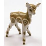 A Russian porcelain figure of a deer, with blue A3 stamp to underside and labelled UYAEB, 21cm high.