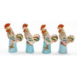 Two pairs of Chinese porcelain figures of cockerels on turquoise bases, enamelled decoration, impres