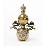 A Chinese bronze opium bottle, with integral spoon stopper, dragon mounts and cast body to the lower