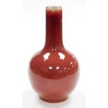 A Chinese porcelain flambe bottle vase, with slender neck, 34cm high.