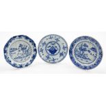 Three Chinese 18thC blue and white plates, one of octagonal form, with outbuildings and trees, 22cm