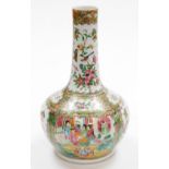 A 19thC Chinese Canton porcelain bottle vase, with slender neck, decorated in enamels with tradition