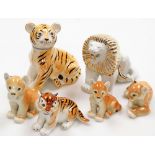 A group of six Russian porcelain lions and tigers, the largest tiger with red stamp to underside, 8c