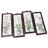 A set of four late 19thC Chinese porcelain panels, each decorated with birds and flowers, in stained