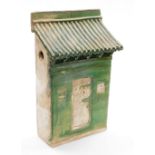 A Chinese Tang style slab pottery model of a house front, with green glaze, probably of the period,