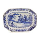 A Chinese blue and white octagonal meat plate, with river landscape scene within floral borders, 18t