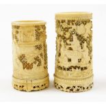 Two Chinese carved and pierced ivory vases, one depicting figures round a table, 10cm high, with woo