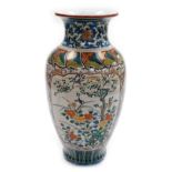 A large Japanese Kutani baluster vase, the panels of birds and flowers in a mountainous landscape, i