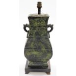 A Chinese bronze vase of square section, converted to a table lamp, with relief archaic style decora