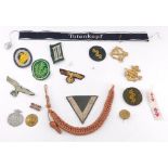 A collection of German badges, to include cloth examples. (a quantity)