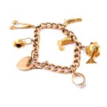 A 9ct rose gold curb link charm bracelet, with six charms as fitted, on a heart shaped padlock clasp