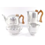 A Picquot ware aluminium four piece tea set, comprising teapot, covered hot water jug, cream jug and