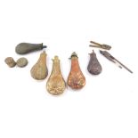 A collection of copper powder flasks, bullet mould, etc. (a quantity)