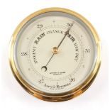 An early 20thC brass ship's aneroid barometer, by Hutchinson & Jackson of Sunderland, 18.5cm diamete