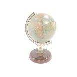 A Chad Valley tin plate terrestrial globe, no.10028, 22cm high.
