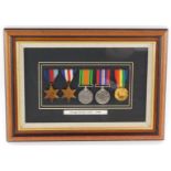 WWII medals, named to George Pettitt, 1939-1946, framed.