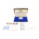 A Danbury Mint Silver Jubilee 1952-1977 silver collectors stamp, boxed.
