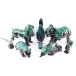 A collection of Canadian Blue Mountain pottery animals, each with a mottled pale blue/green glaze, t