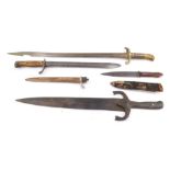 A collection of bayonets, edged weapons to include WWI German example, etc. (a quantity)