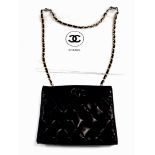 A Chanel black leather quilted shoulder bag, with logo, signature, double flap closure, internal com