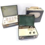 A Pye leatherette and cream Bakelite radio, and two Vidor cased radios. (3)