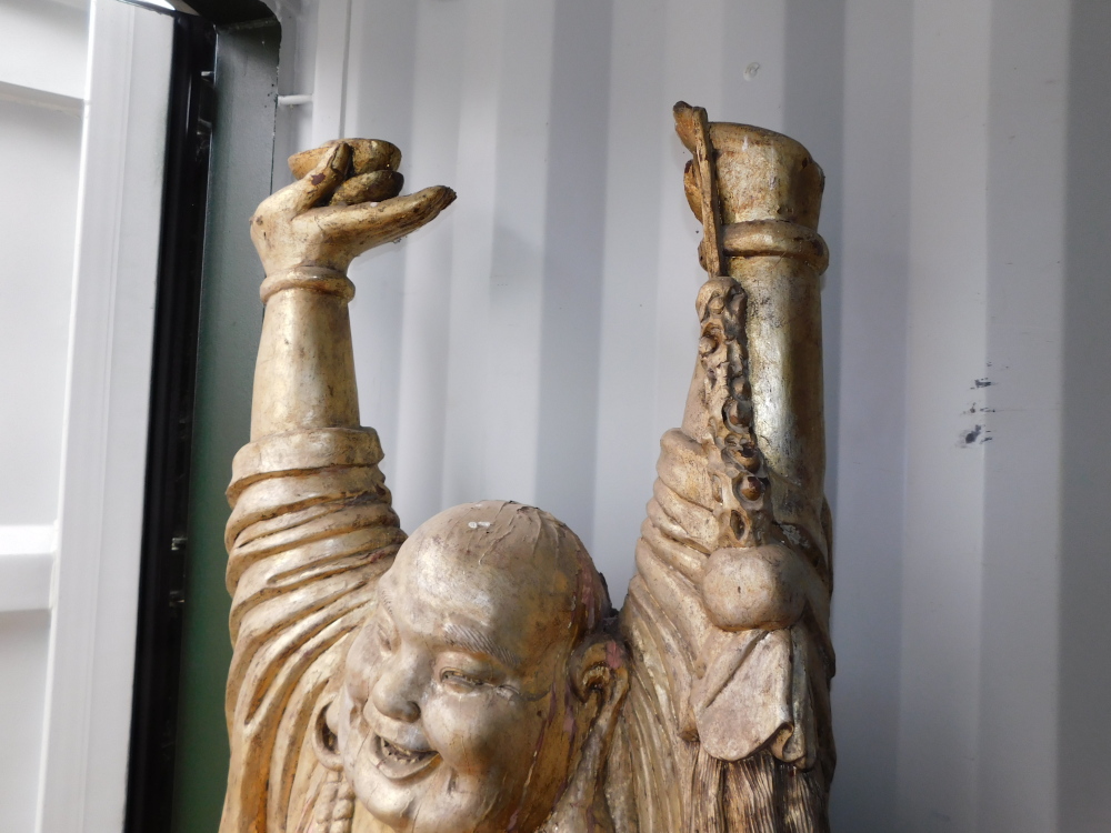 A lifesize gilt wood figure of Buddha, modeled standing with his hands raised, a necklace about his - Image 3 of 3