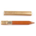 A 9ct gold pencil holder, with pencil, 6.2g.