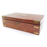 A Victorian mahogany and brass bound campaign writing box, the hinged top with a vacant brass cartou