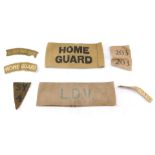A collection of Home Guard insignia, to include Ulster Home Guard title., Home Guard arm band, etc.