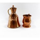 An Eastern style lidded pot, bell shaped, together with a copper tankard, stamped to the border R.W.