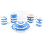 A group of T G Green blue banded Cornish ware, comprising a muffin dish and cover, jar and cover, fl