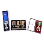 A group of miniature medals, named to Major K W Black, CBE., TD., JP., Lived 1.2.07 to 11.08.78., co