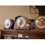 An oak cased mantel clock, with Westminster chimes, and two other clocks. (3)